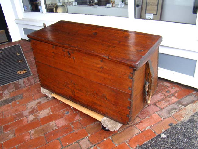 An antique double canted American sailors' sea chest with ropework beckets circa 1790-1825